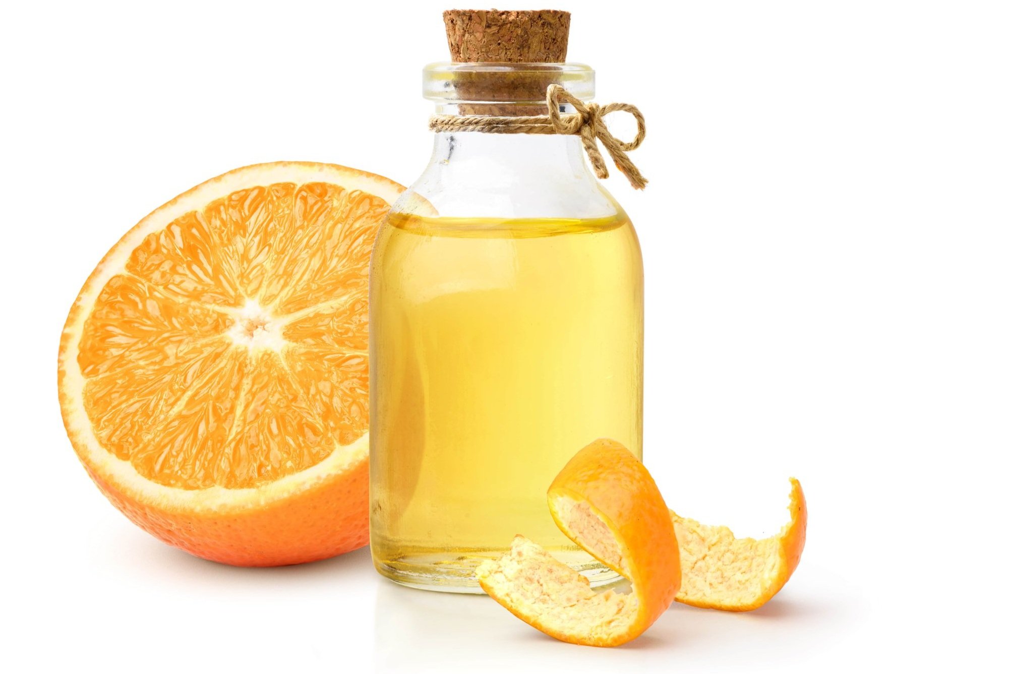 Half of an orange and orange essence
